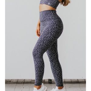 Astoria IGNITE legging. Black with white spectacles. Full length in medium.